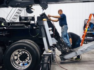 Men working on Heavy Duty Truck