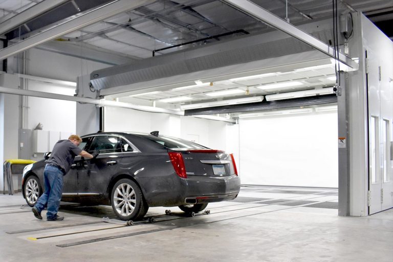 pushing car into GFS Paint Booth with Side-Load system