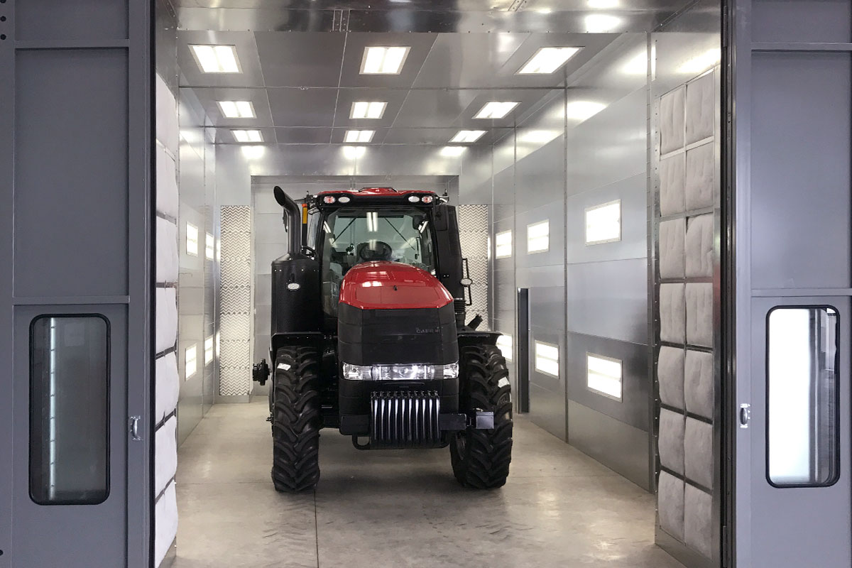 GFS Large Equipment paint booth with tractor being painted inside