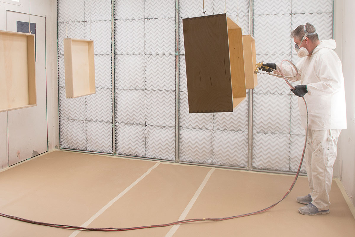 Woodworking inside a GFS woodworking booth