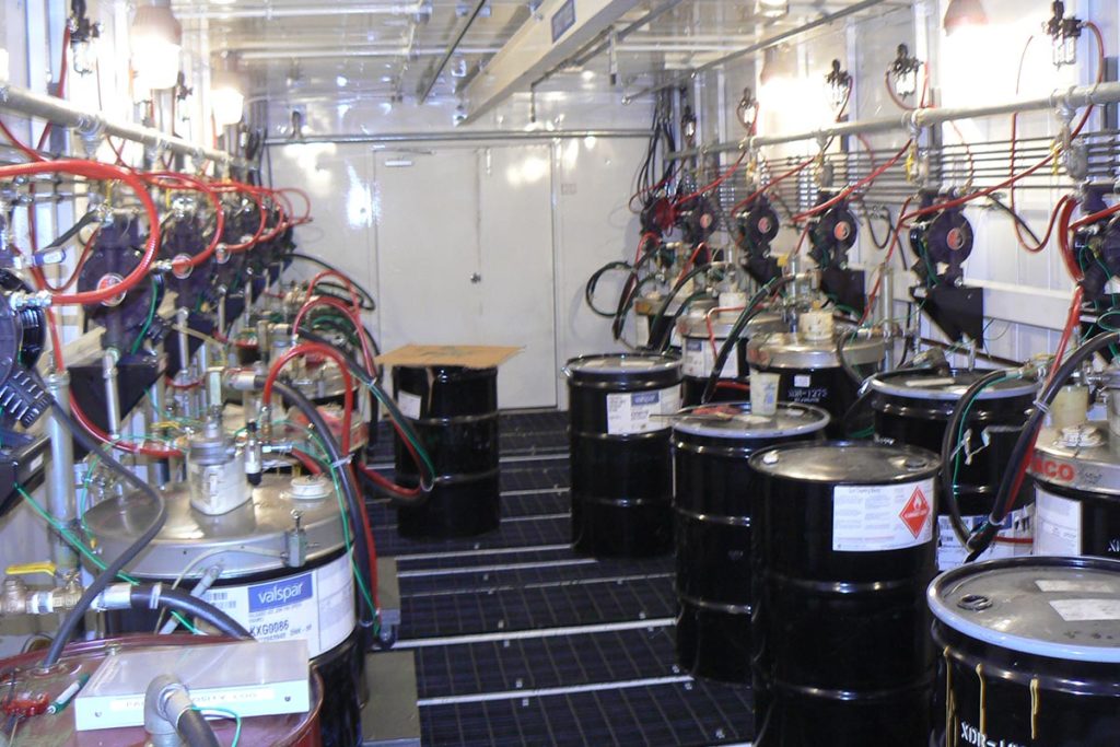 Paint drums inside a GFS Hazardous Material Storage Building